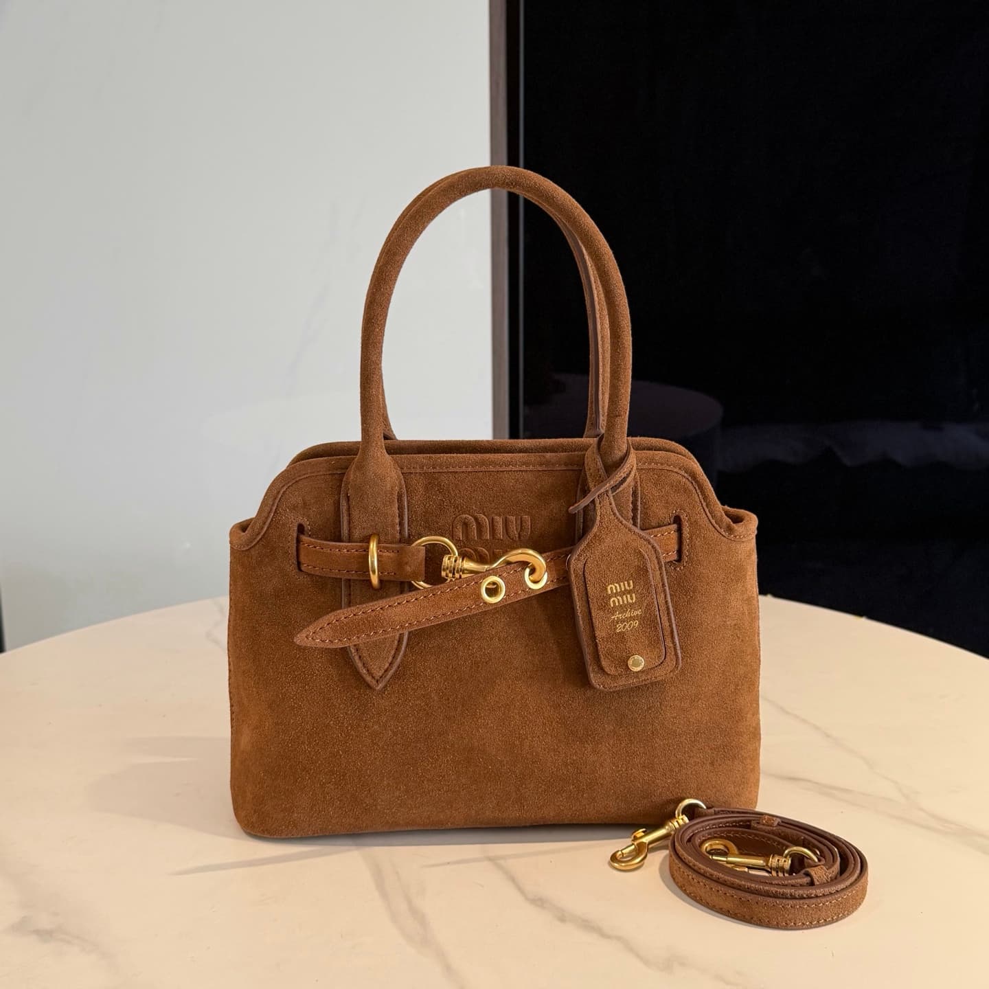 Aventure suede leather bag