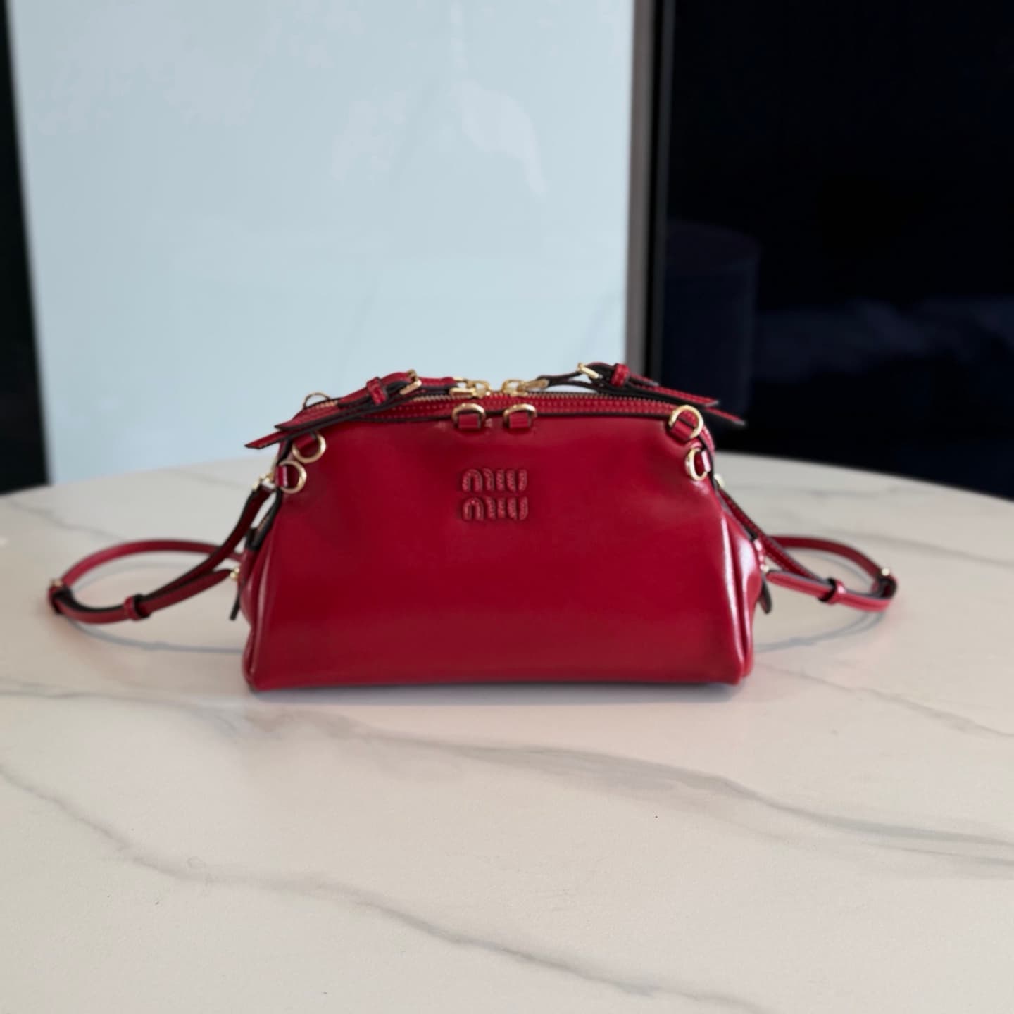 Caprice leather clutch