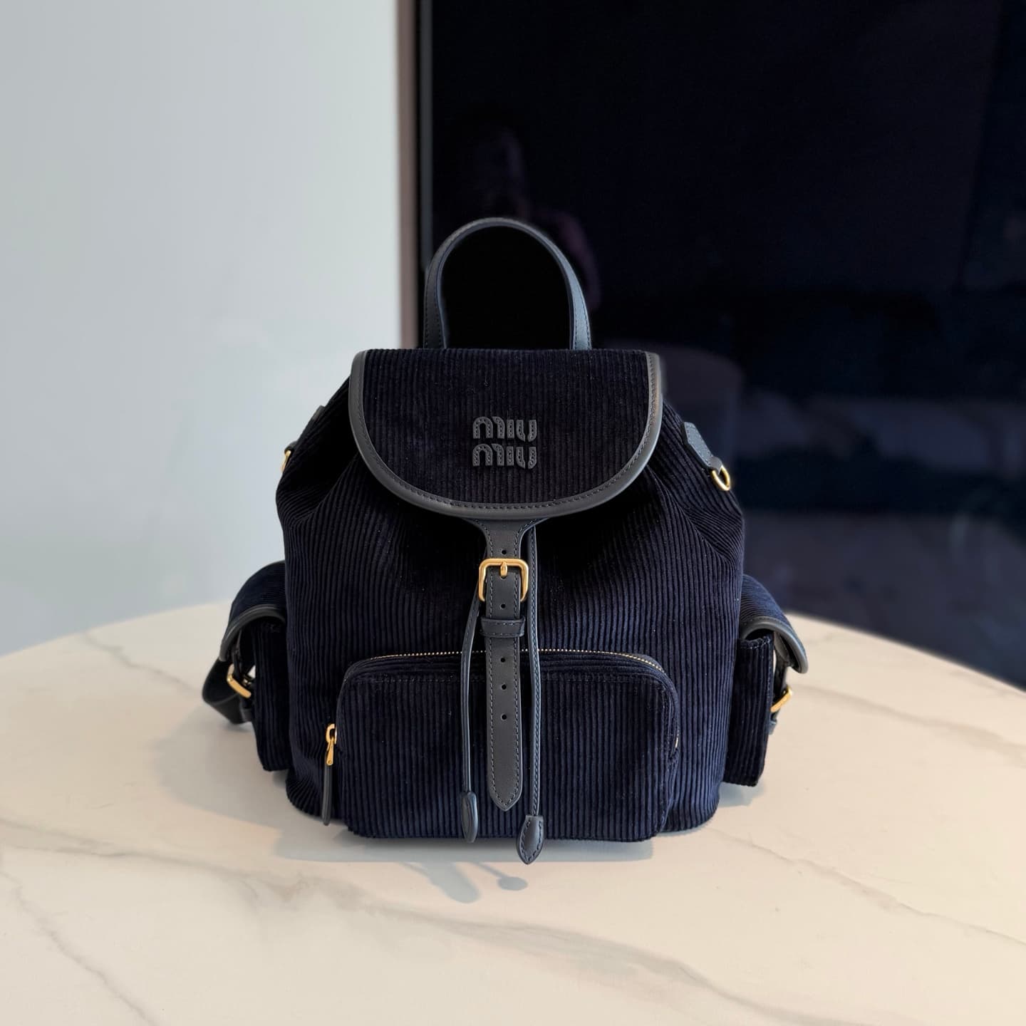 Corduroy and leather backpack